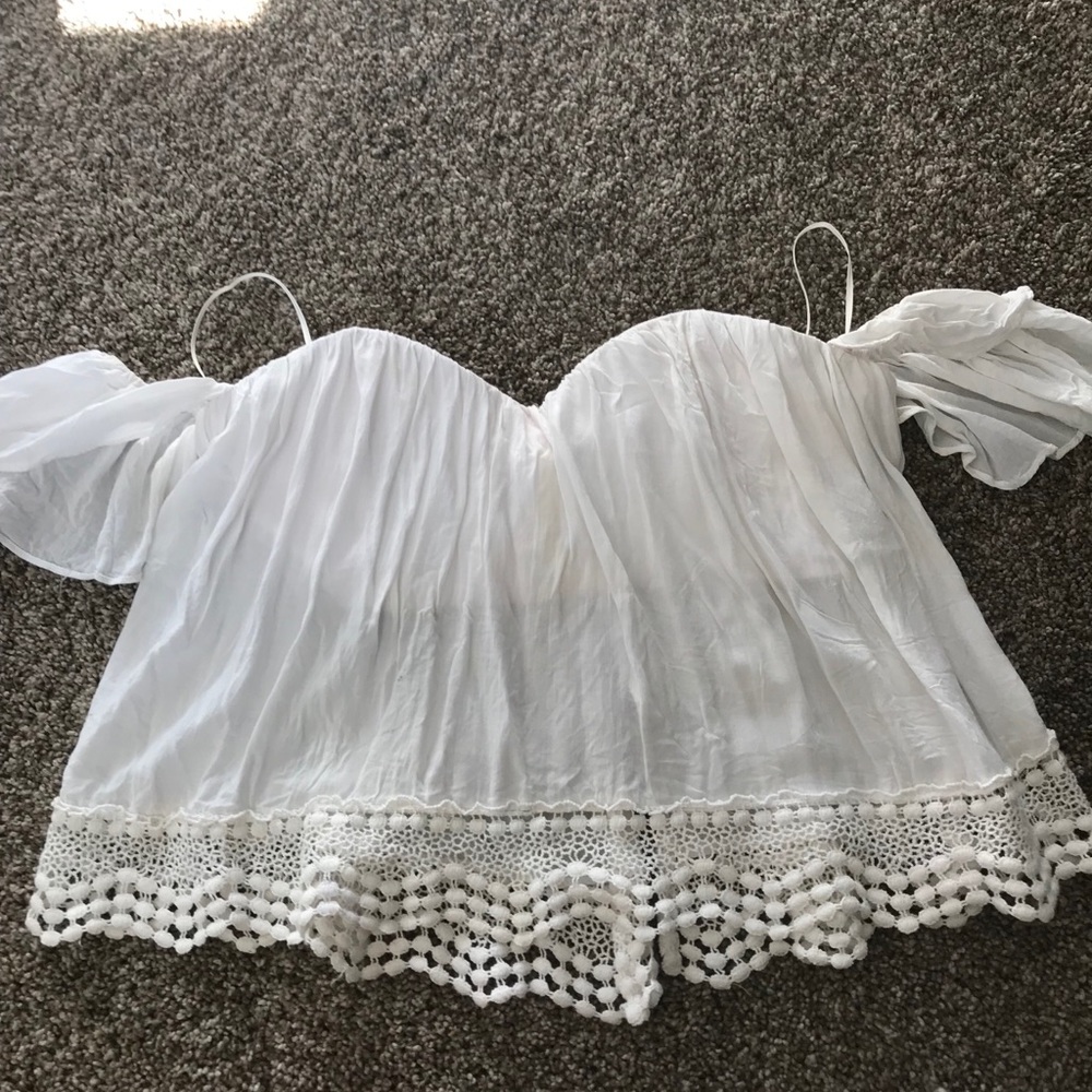 Stella flows off the shoulder crop top